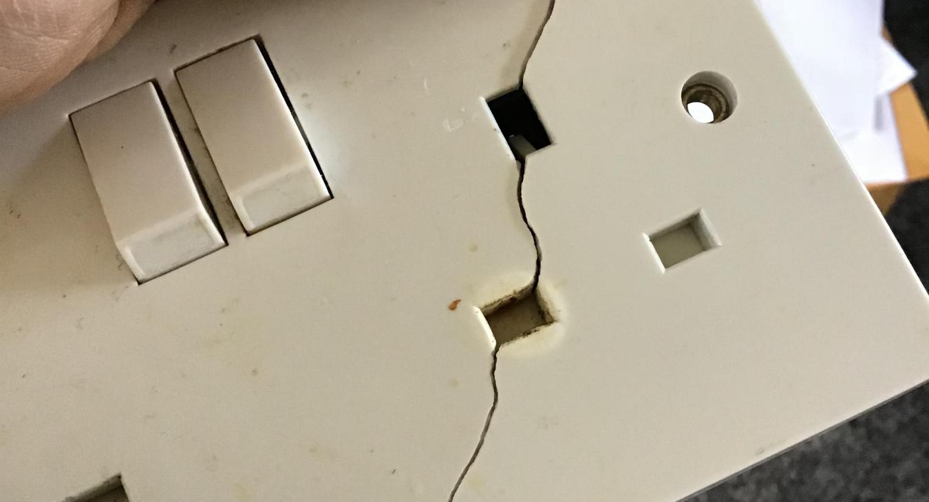 Bearsted electrician replaced split plug socket split in half
