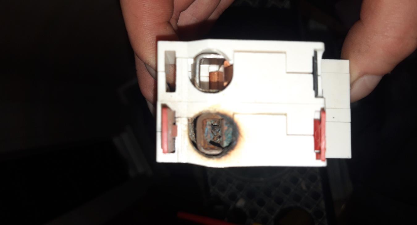 Experienced Chatham Electrician Spots Burnt Out Main Switch Terminal Caused by Loose Connections and Heat Build-Up!