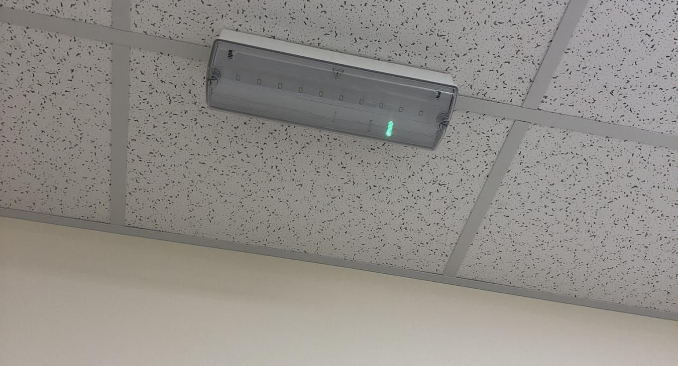 Commercial electrician investigated faulty emergency light, we'll be back to replace it soon enough