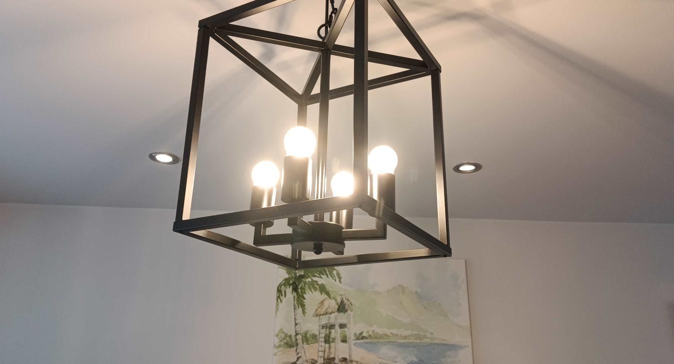Small job electrician in Hempstead installing ceiling light