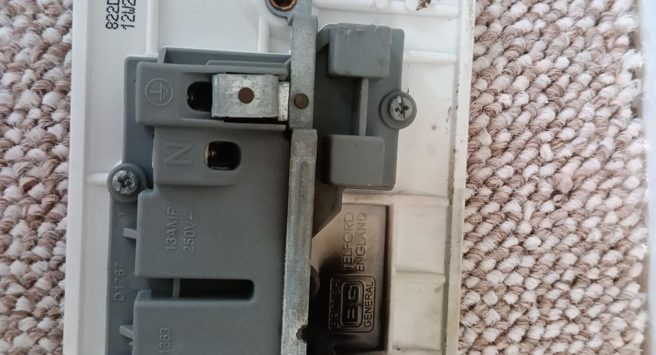 socket with black marks from live to earth fault in Maidstone, Kent