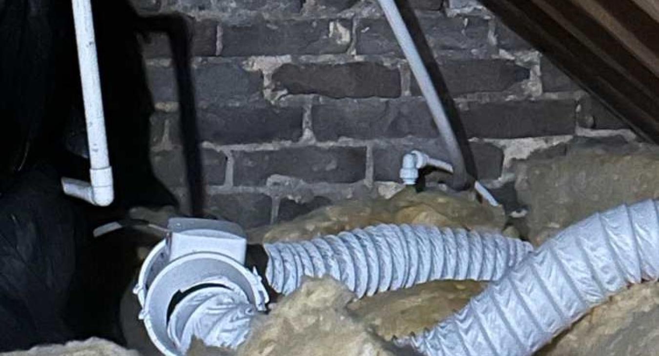 the existing fan that we found to be venting into the loft space